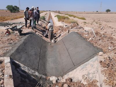 ترمیم آبشستگی و لاینینگ کانال های فرعی شبکه کوثر در حال انجام است