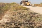 پایان عملیات رگلاژ و علف چینی کانال های آبیاری شبکه آبیاری شمال شرق اهواز